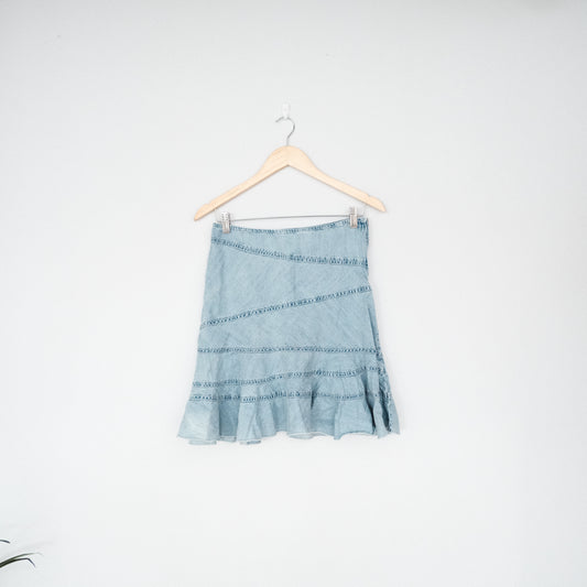 UO Millie Fluted Denim Mini Skirt